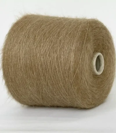 Бобінна пряжа кідмохер Igea Astro50 колір 9014 кемел меланж Склад: 50% супер кідмохер, 32% поліамід, 18% меринос