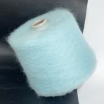 Бобінна пряжа кідмохер Італія ментолового кольору Pura Lana купить на павутинку 60% супер кідмохер