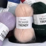 YarnArt Mohair Trendy 145 персиковий Склад: 50% мохер товстий та довговорсий, 50% акрил Вага: 100 г Метраж: 220 м Виробник: Туреччина